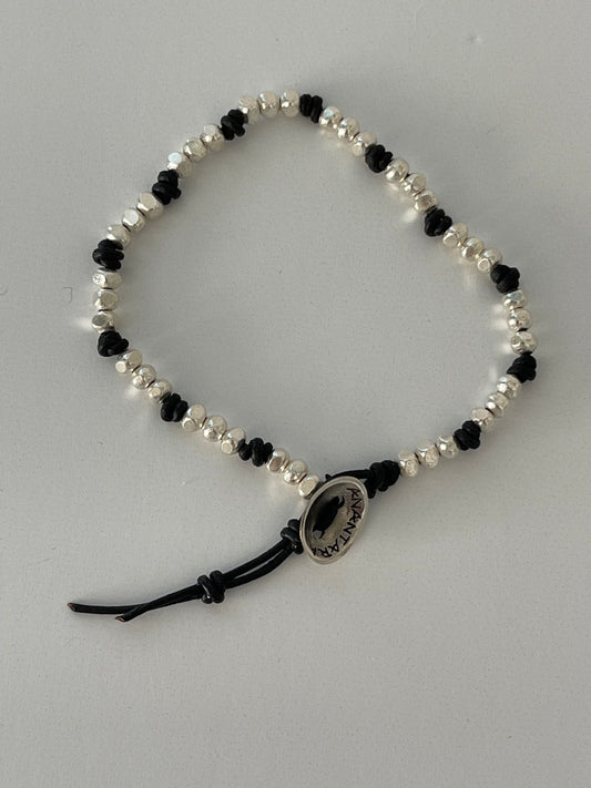 Knotted leather and silver bracelet