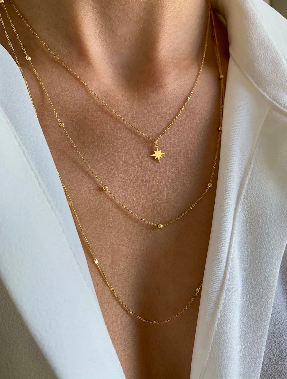 TRIPLE ROW NECKLACE WITH STAR PENDANT