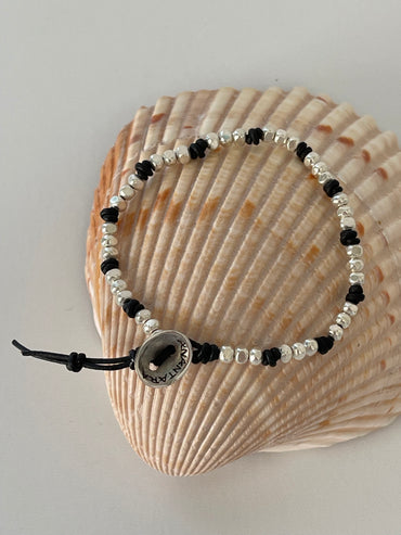 Knotted leather and silver bracelet