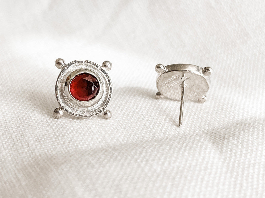 SILVER GARNET MEDALLION STUD EARRINGS