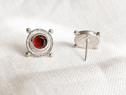 SILVER GARNET MEDALLION STUD EARRINGS