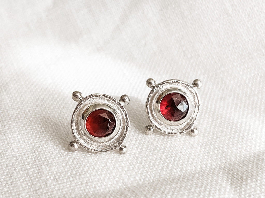 SILVER GARNET MEDALLION STUD EARRINGS